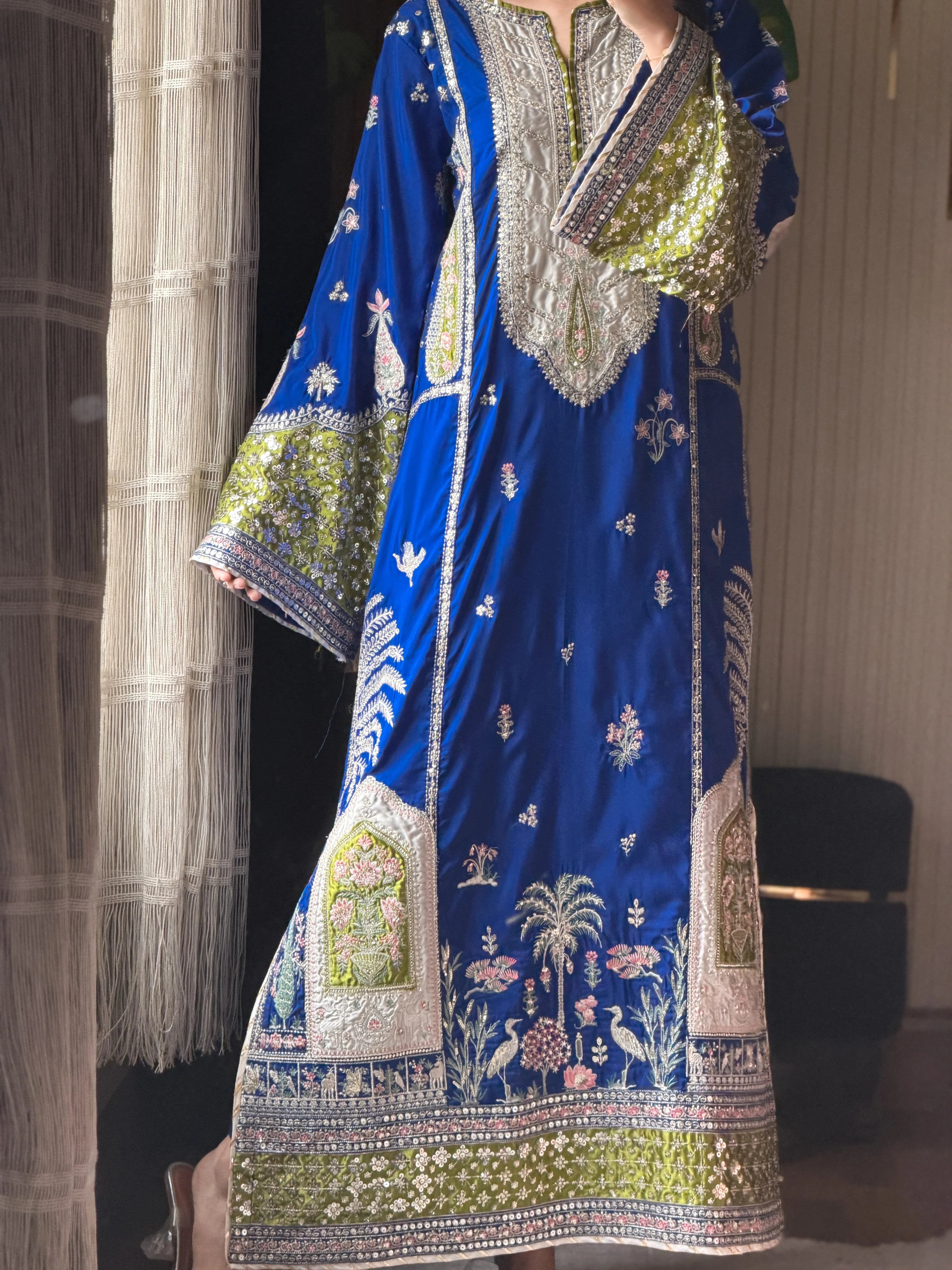 Chaman kaftan side view embroidered sleeve detail
