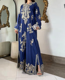 Full-length front shot of a regal sapphire royal blue stitched silk maxi dress featuring heavy traditional hand-embellishment on the borders.