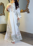 Ivory embroidered kaftan side view showing bell sleeve and hem embroidery