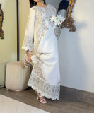 Ivory embroidered kaftan styled with heart-shaped sequin clutch