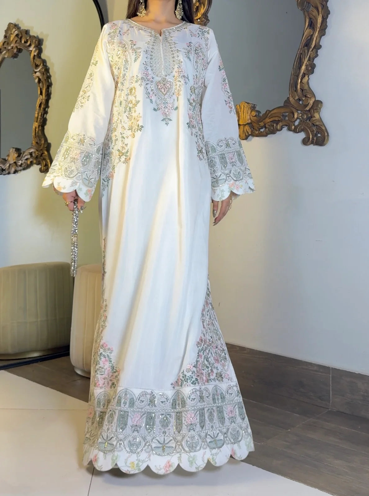 Ivory kaftan bell sleeve close-up with embroidered scalloped cuff