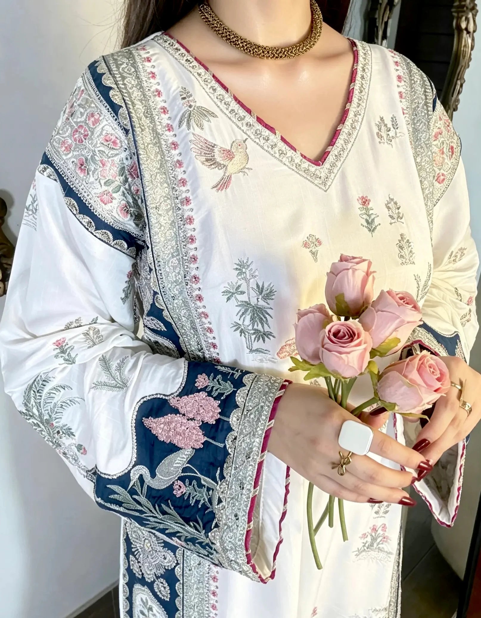 Ivory kaftan bishop sleeve navy embroidery detail