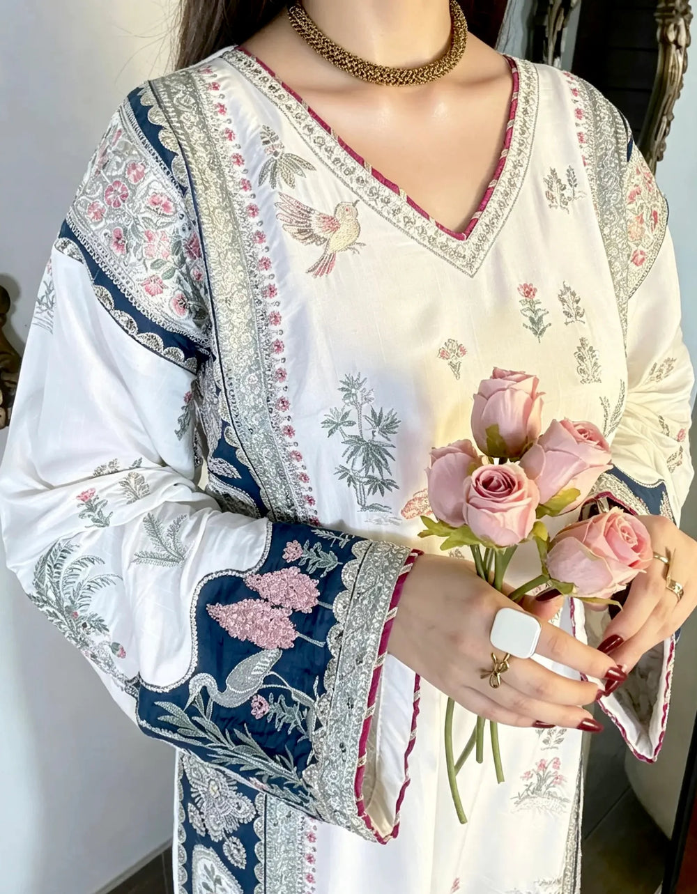 Ivory kaftan bishop sleeve navy embroidery detail