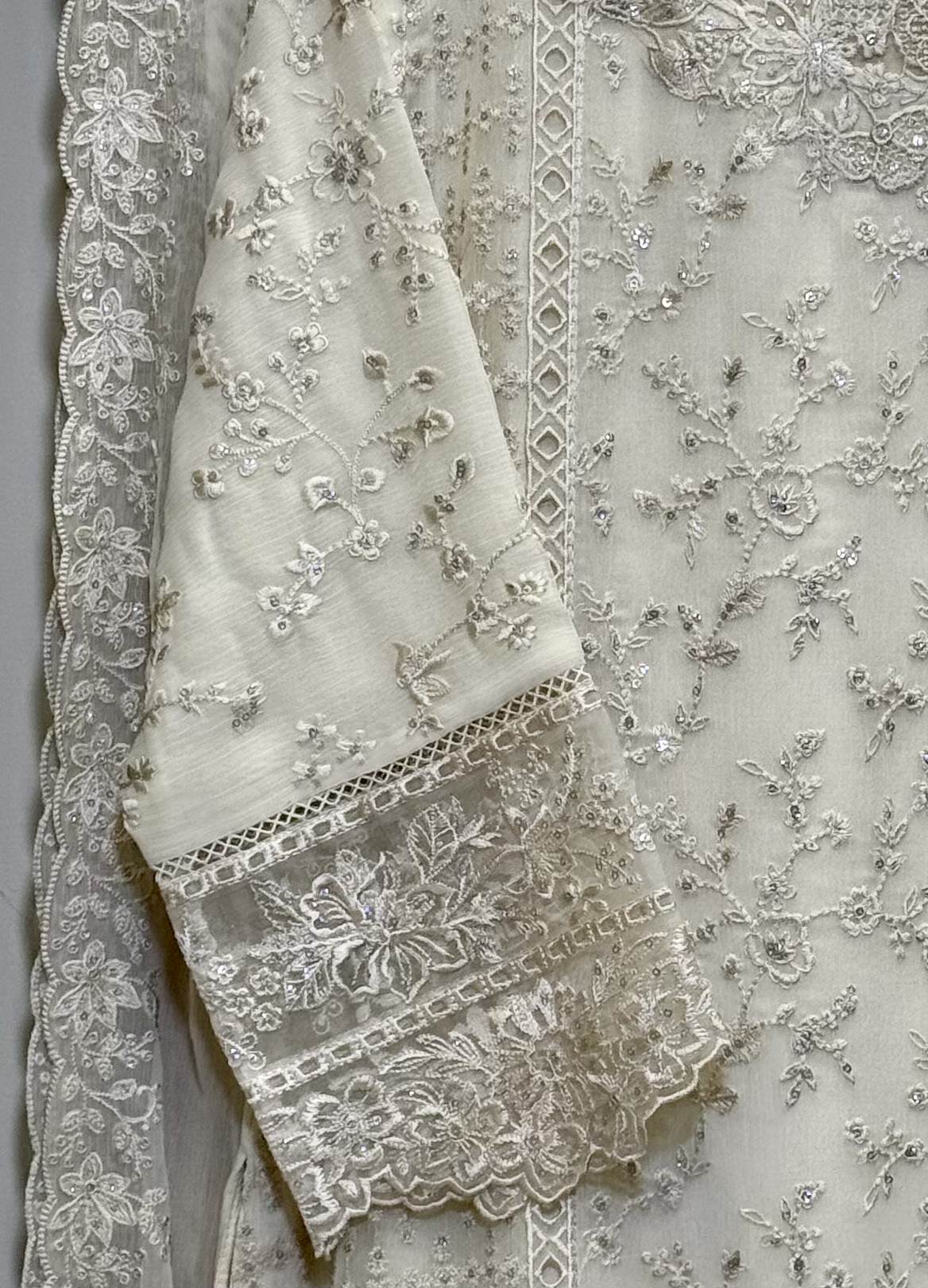 Seleves view of sequins embroidered chiffon shirt with organza neck patch and borders