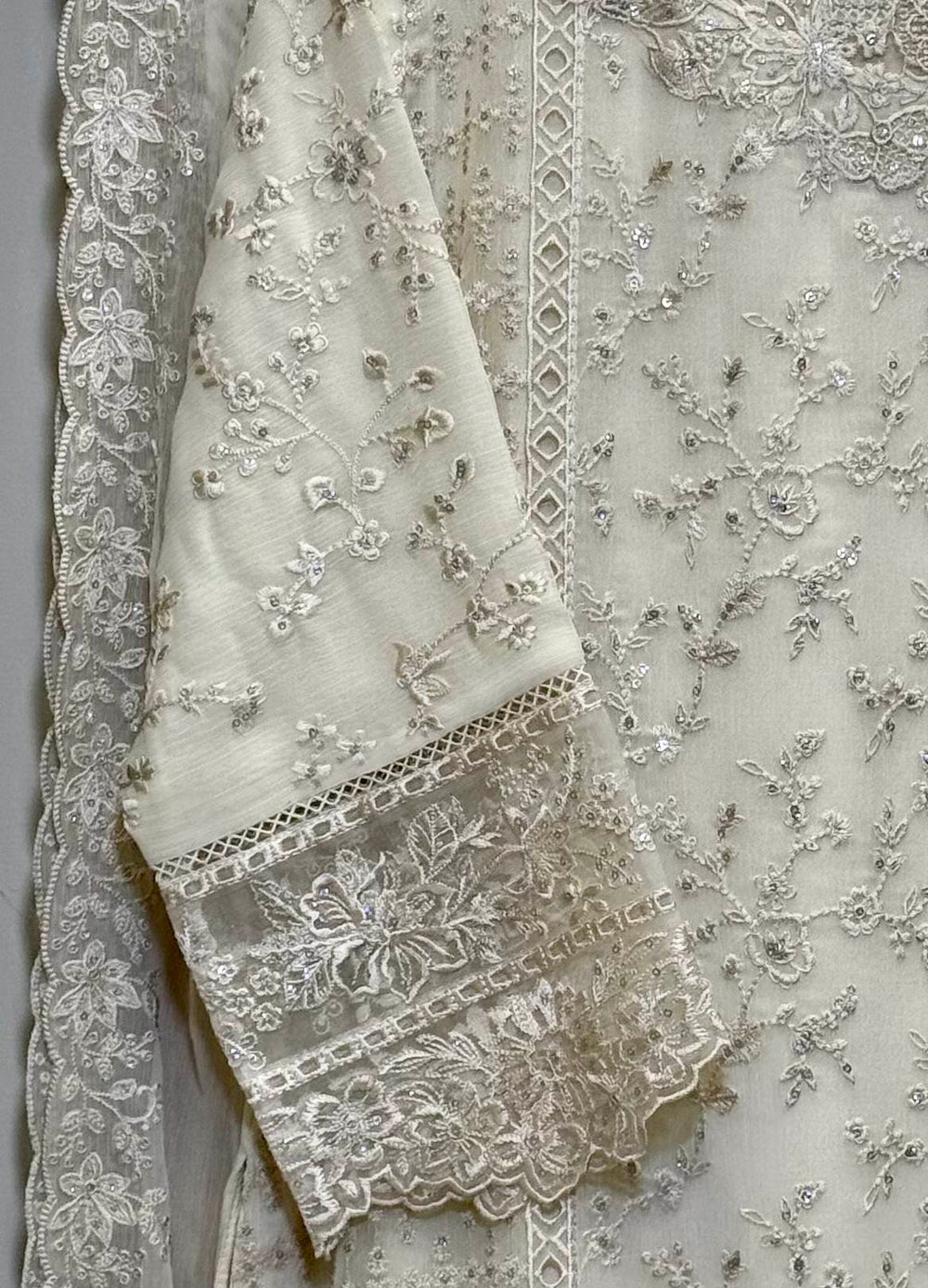 Seleves view of sequins embroidered chiffon shirt with organza neck patch and borders