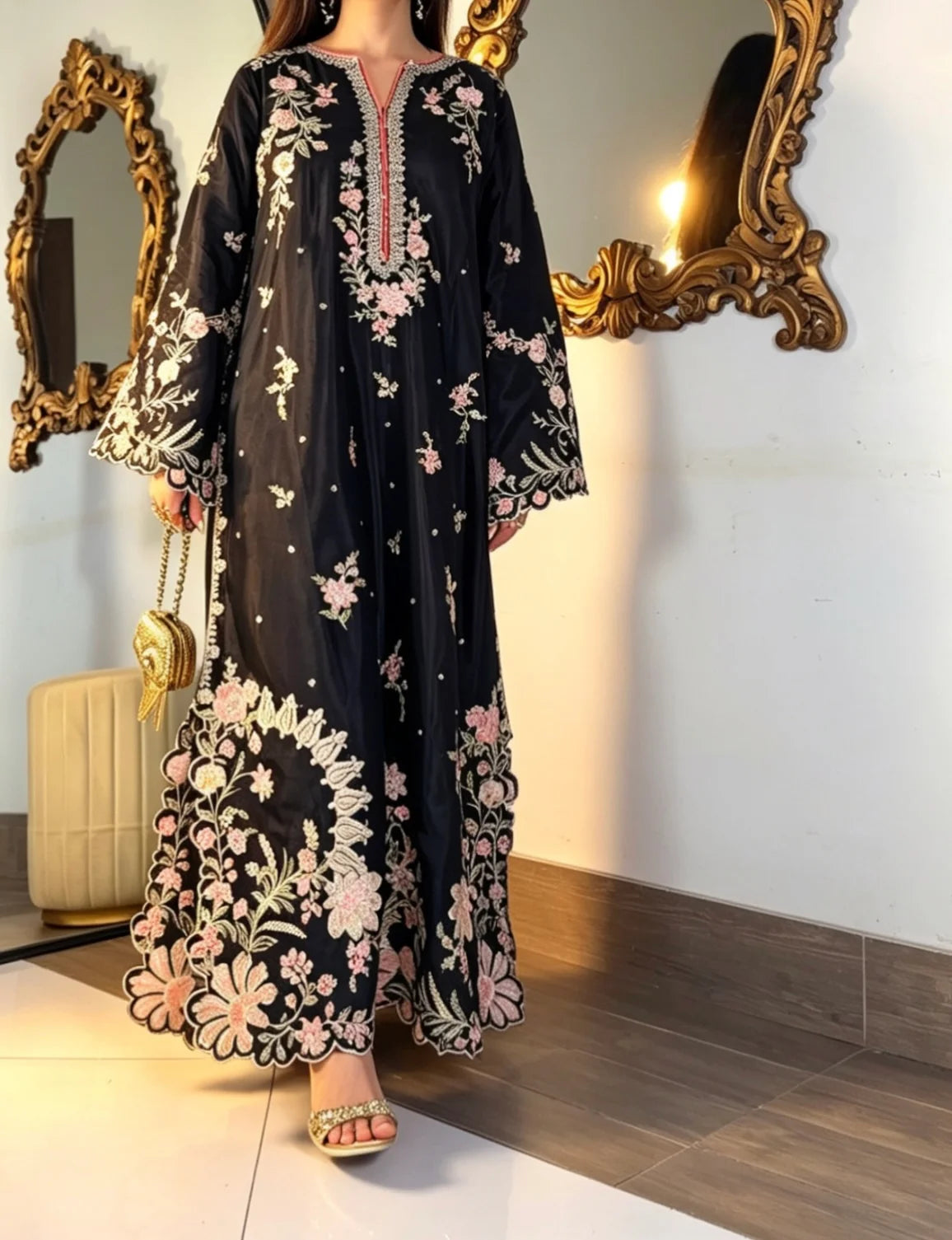 Cutwork embroidery detail on black silk kaftan
