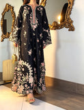 Cutwork embroidery detail on black silk kaftan
